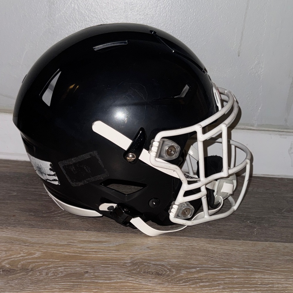 Black Football Helmet with White Cage